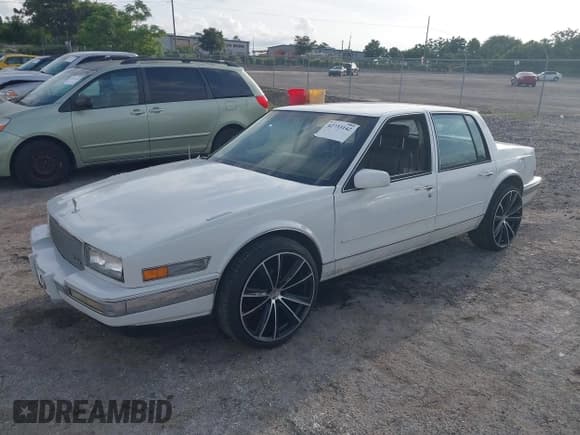 ✅ 1987 Cadillac Seville • VIN: 1G6KS518XHU806925 • Lot: 42733142. Listed on IAAI with 116,497 mi. Free auction sales archive from the USA and detailed vehicle history report at DreamBid. Image 2.