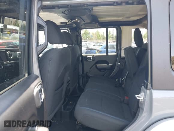 ✅ 2023 Jeep Wrangler Rubicon • VIN: 1C4JJXR64PW700323 • Лот: 42407681. Опубликован ранее на IAAI с пробегом 21 034 миль. Бесплатный доступ к архиву аукционных продаж из США и подробный отчёт об истории автомобиля на DreamBid. Изображение 8.