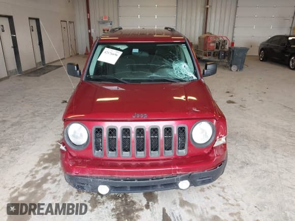 ✅ 2014 Jeep Patriot Latitude • VIN: 1C4NJRFB1ED713506 • Lot: 42176696. Listed on IAAI with 118,509 mi. Free auction sales archive from the USA and detailed vehicle history report at DreamBid. Image 12.