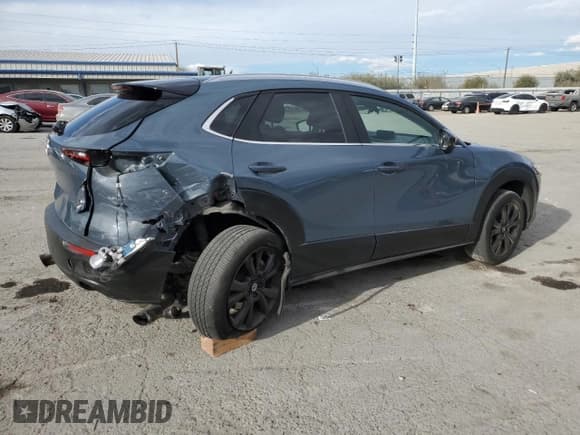 ✅ 2022 Mazda CX-30 2.5 Turbo • VIN: 3MVDMBAY8NM447233 • Lot: 85157134. Listed on Copart with 29,560 mi. Free auction sales archive from the USA and detailed vehicle history report at DreamBid. Image 3.