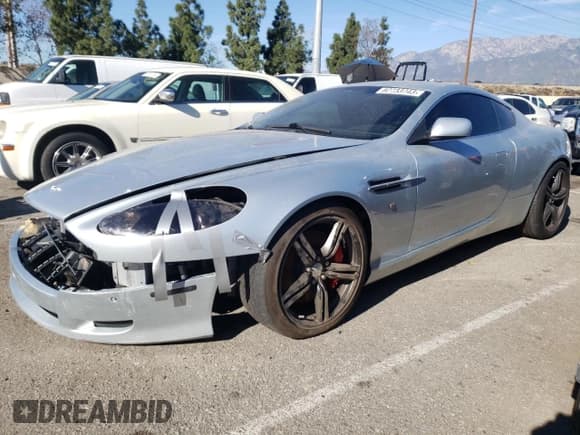 ✅ 2007 Aston Martin DB9 • VIN: SCFAB01A37GA08055 • Lot: 82733743. Wystawiony na Copart z przebiegiem 39 201 mil. Bezpłatny archiwum sprzedaży aukcyjnych z USA i szczegółowy raport historii pojazdu na DreamBid. Zdjęcie 1.