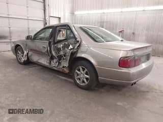 ✅ 2004 Cadillac Seville Luxury SLS • VIN: 1G6KS54Y74U163861 • Lot: 41881291. Listed on IAAI with 215,518 mi. Free auction sales archive from the USA and detailed vehicle history report at DreamBid. Image 3.