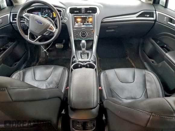 ✅ 2015 Ford Fusion Titanium Hybrid • VIN: 3FA6P0RU6FR179817 • Lot: 95251945. Wystawiony na Copart z przebiegiem 115 636 mil. Bezpłatny archiwum sprzedaży aukcyjnych z USA i szczegółowy raport historii pojazdu na DreamBid. Zdjęcie 8.