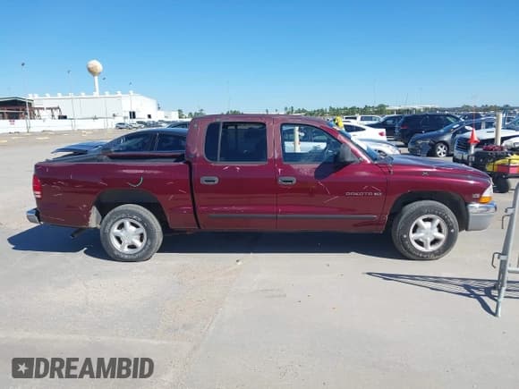 ✅ 2000 Dodge Dakota Sport • VIN: 1B7GL2AX8YS723964 • Lot: 43570529. Listed on IAAI with 136,989 mi. Free auction sales archive from the USA and detailed vehicle history report at DreamBid. Image 13.