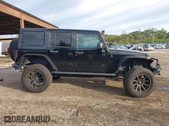 ✅ 2016 Jeep Wrangler Unlimited Sport • VIN: 1C4BJWDG6GL147979 • Lot: 43459433. Listed on IAAI with 85,040 mi. Free auction sales archive from the USA and detailed vehicle history report at DreamBid. Image 13.