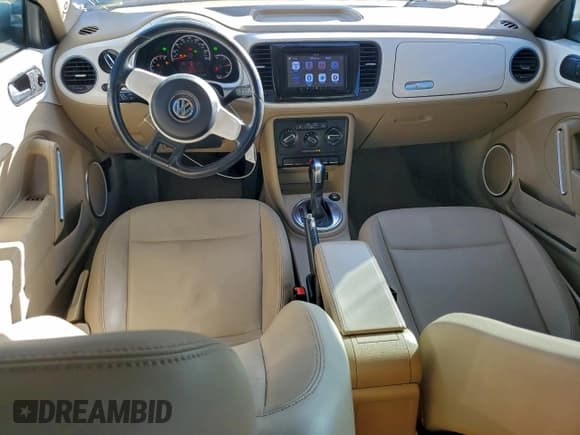 ✅ 2013 Volkswagen Beetle 2.5L • VIN: 3VWJX7AT2DM669016 • Lot: 94439545. Listed on Copart with 82,512 mi. Free auction sales archive from the USA and detailed vehicle history report at DreamBid. Image 8.