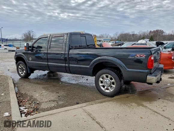✅ 2012 Ford F-250 Lariat • VIN: 1FT7W2BT5CED05128 • Lot: 92630475. Listed on Copart with 218,559 mi. Free auction sales archive from the USA and detailed vehicle history report at DreamBid. Image 2.