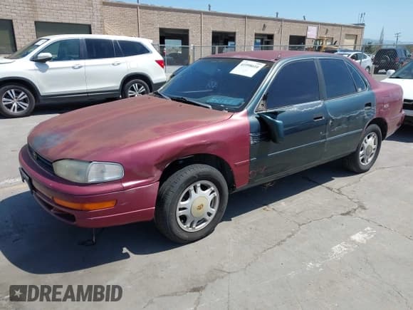 ✅ 1992 Toyota Camry DLX • VIN: 4T1SK11E5NU082614 • Лот: 41998616. Опубликован ранее на IAAI с пробегом 263 605 миль. Бесплатный доступ к архиву аукционных продаж из США и подробный отчёт об истории автомобиля на DreamBid. Изображение 2.