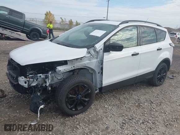 ✅ 2018 Ford Escape SE • VIN: 1FMCU9GD0JUB28663 • Лот: 43469503. Опубликован ранее на IAAI с пробегом 127 879 миль. Бесплатный доступ к архиву аукционных продаж из США и подробный отчёт об истории автомобиля на DreamBid. Изображение 19.