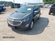 ✅ 2019 Chevrolet Equinox Premier • VIN: 2GNAXNEV4K6184569 • Lot: 42670537. Listed on IAAI with 163,594 mi. Free auction sales archive from the USA and detailed vehicle history report at DreamBid. Image 2.