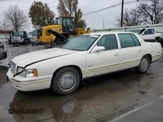 ✅ 1997 Cadillac DeVille DHS • VIN: 1G6KE54Y3VU291247 • Lot: 81789724. Listed on Copart with 105,212 mi. Free auction sales archive from the USA and detailed vehicle history report at DreamBid. Image 1.