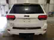 2018 Jeep Grand Cherokee Altitude z VIN 1C4RJFAG4JC397098, wystawiony jako Copart lot #82310585 z przebiegiem 138 914 mil mil oraz Szkoda całkowita • Salvage title. Historia ofert i sprzedaży dostępna na DreamBid. Obrazek 6.