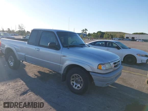 ✅ 2002 Mazda B-Series DS • VIN: 4F4YR16U22TM13054 • Lot: 41768855. Listed on IAAI with 144,939 mi. Free auction sales archive from the USA and detailed vehicle history report at DreamBid. Image 1.