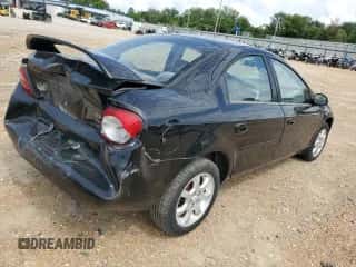 2004 Dodge Neon SXT with VIN 1B3ES56CX4D644832, listed as a Copart auction lot 62601334 with 165,493 mi miles and Salvage title. Bid and sale history available at DreamBid. Image 3.
