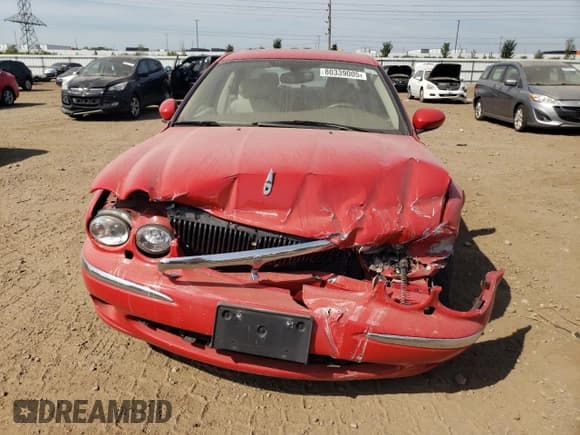 ✅ 2002 Jaguar X-Type • VIN: SAJEA51D52XC67019 • Lot: 80339005. Wystawiony na Copart z przebiegiem 74 558 mil. Bezpłatny archiwum sprzedaży aukcyjnych z USA i szczegółowy raport historii pojazdu na DreamBid. Zdjęcie 5.