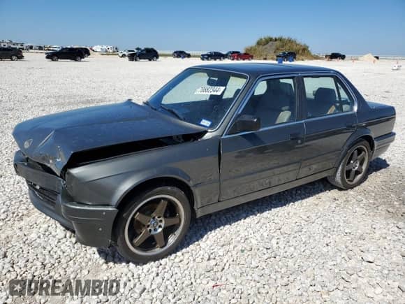 1987 BMW 3 Series 325i with VIN WBAAD2309H2446547, listed as a Copart auction lot 70882344 with 187,806 mi miles and Salvage title. Bid and sale history available at DreamBid. Image 1.
