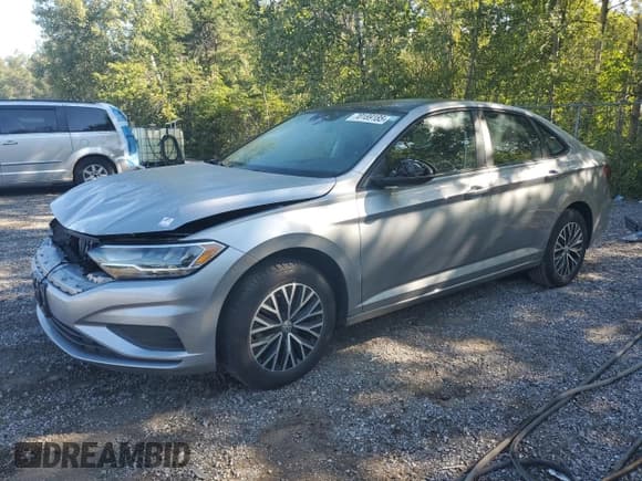 ✅ 2021 Volkswagen Jetta SEL • VIN: 3VWE57BU8MM077716 • Лот: 70189185. Опубликован ранее на Copart с пробегом 50 603 миль. Бесплатный доступ к архиву аукционных продаж из США и подробный отчёт об истории автомобиля на DreamBid. Изображение 1.