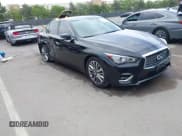 ✅ 2021 Infiniti Q50 Luxe • VIN: JN1EV7BP3MM701837 • Lot: 42243662. Listed on IAAI with 63,927 mi. Free auction sales archive from the USA and detailed vehicle history report at DreamBid. Image 1.