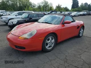 ✅ 2000 Porsche Boxster • VIN: WP0CA2986YU625246 • Lot: 70760385. Listed on Copart with 122,631 mi. Free auction sales archive from the USA and detailed vehicle history report at DreamBid. Image 1.