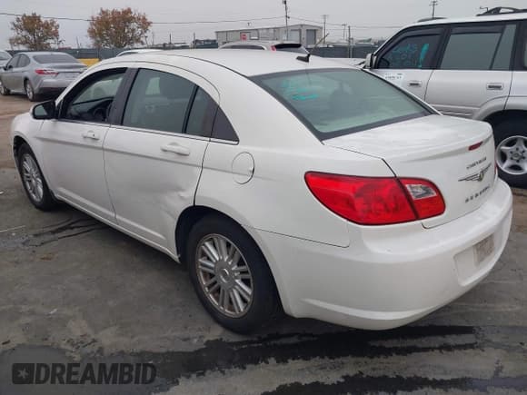 ✅ 2009 Chrysler Sebring Touring • VIN: 1C3LC56B49N531295 • Lot: 43859549. Listed on IAAI with 244,776 mi. Free auction sales archive from the USA and detailed vehicle history report at DreamBid. Image 3.