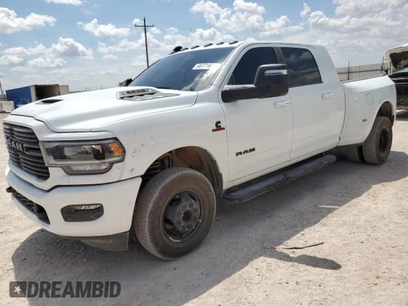 ✅ 2024 Ram 3500 Laramie • VIN: 3C63RRML0RG229435 • Lot: 80484814. Listed on Copart with 23,721 mi. Free auction sales archive from the USA and detailed vehicle history report at DreamBid. Image 1.