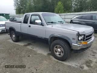1994 Dodge Dakota z VIN 1B7GG23Y9RS590756, wystawiony jako Copart lot #66048685 z przebiegiem 127 408 mil mil oraz Szkoda całkowita • Salvage title. Historia ofert i sprzedaży dostępna na DreamBid. Obrazek 4.