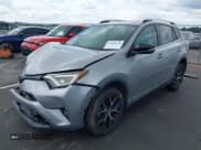✅ 2016 Toyota RAV4 SE • VIN: 2T3NFREV8GW269088 • Lot: 43034325. Wystawiony na IAAI z przebiegiem 141 098 mil. Bezpłatny archiwum sprzedaży aukcyjnych z USA i szczegółowy raport historii pojazdu na DreamBid. Zdjęcie 2.