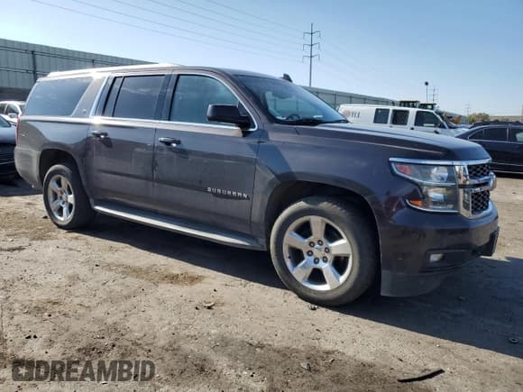 ✅ 2015 Chevrolet Suburban LT • VIN: 1GNSCJKC1FR508194 • Lot: 65947724. Listed on Copart with 147,686 mi. Free auction sales archive from the USA and detailed vehicle history report at DreamBid. Image 4.