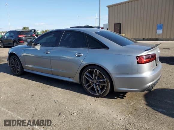 ✅ 2016 Audi S6 Premium Plus • VIN: WAUF2AFC6GN101341 • Лот: 69450435. Опубликован ранее на Copart с пробегом 82 789 миль. Бесплатный доступ к архиву аукционных продаж из США и подробный отчёт об истории автомобиля на DreamBid. Изображение 2.
