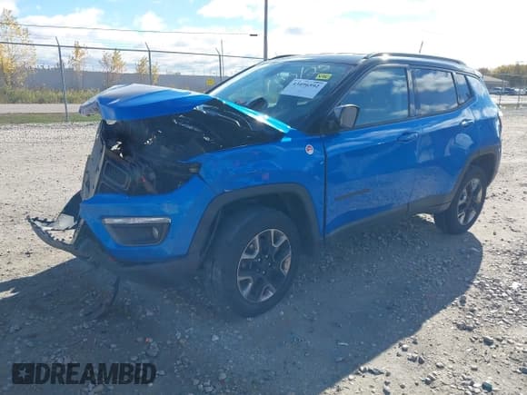 ✅ 2018 Jeep Compass Trailhawk • VIN: 3C4NJDDB5JT299382 • Lot: 43496592. Wystawiony na IAAI z przebiegiem 102 288 mil. Bezpłatny archiwum sprzedaży aukcyjnych z USA i szczegółowy raport historii pojazdu na DreamBid. Zdjęcie 2.