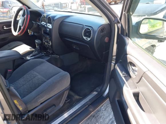 ✅ 2006 GMC Envoy SLE • VIN: 1GKDT13S662122195 • Lot: 42228257. Listed on IAAI with 177,365 mi. Free auction sales archive from the USA and detailed vehicle history report at DreamBid. Image 5.