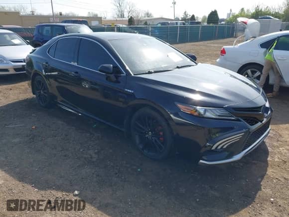 2021 Toyota Camry Hybrid XSE z VIN 4T1K31AK5MU024696, wystawiony jako IAAI lot #42095395 z przebiegiem 61 146 mil mil oraz . Historia ofert i sprzedaży dostępna na DreamBid. Obrazek 1.