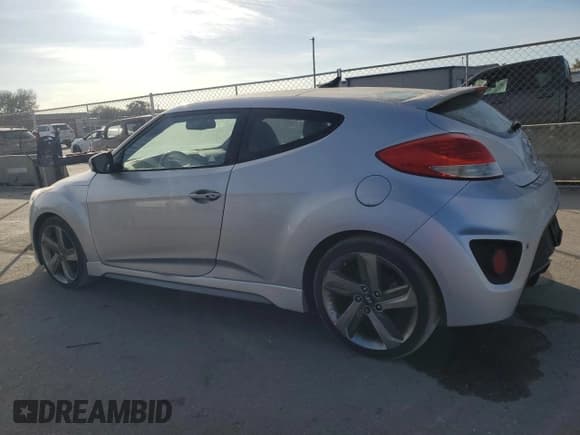 ✅ 2013 Hyundai Veloster Turbo • VIN: KMHTC6AEXDU128130 • Lot: 83827214. Wystawiony na Copart z przebiegiem 173 288 mil. Bezpłatny archiwum sprzedaży aukcyjnych z USA i szczegółowy raport historii pojazdu na DreamBid. Zdjęcie 2.