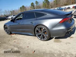 ✅ 2022 Audi RS 7 • VIN: WUAPCBF22NN912345 • Лот: 41202044. Опубликован ранее на Copart с пробегом 5 076 миль. Бесплатный доступ к архиву аукционных продаж из США и подробный отчёт об истории автомобиля на DreamBid. Изображение 2.