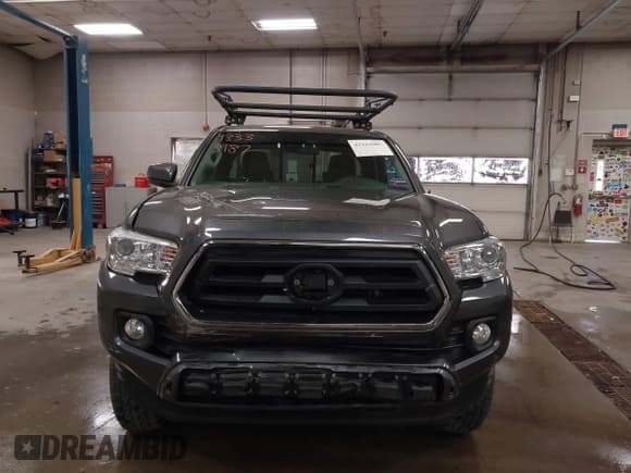 ✅ 2022 Toyota Tacoma SR • VIN: 3TYRX5GN2NT038677 • Lot: 43333987. Listed on IAAI with 56,767 mi. Free auction sales archive from the USA and detailed vehicle history report at DreamBid. Image 12.