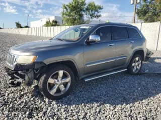 2012 Jeep Grand Cherokee Overland with VIN 1C4RJECTXCC137764, listed as a Copart auction lot 89917855 with 178,285 mi miles and Clean title. Bid and sale history available at DreamBid. Image 1.