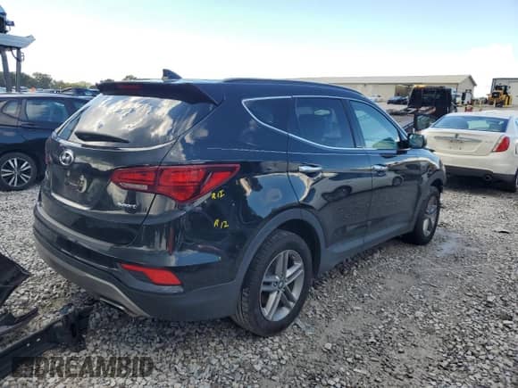 2017 Hyundai Santa Fe 2.4L z VIN 5NMZU3LB2HH041686, wystawiony jako Copart lot #84218665 z przebiegiem 146 906 mil mil oraz Czysty tytuł • Clean title. Historia ofert i sprzedaży dostępna na DreamBid. Obrazek 3.