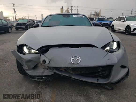 ✅ 2024 Mazda MX-5 Miata Club • VIN: JM1NDAL71R0607675 • Лот: 91052035. Опубликован ранее на Copart с пробегом 11 642 миль. Бесплатный доступ к архиву аукционных продаж из США и подробный отчёт об истории автомобиля на DreamBid. Изображение 5.