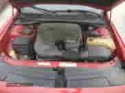 2012 Dodge Challenger SXT z VIN 2C3CDYAG9CH210824, wystawiony jako Copart lot #76201764 z przebiegiem 97 698 mil mil oraz Nie do naprawy • Non repairable. Historia ofert i sprzedaży dostępna na DreamBid. Obrazek 11.