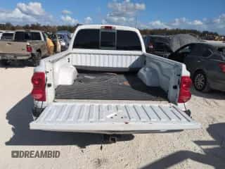 2006 Dodge Dakota SLT z VIN 1D7HE48NX6S636343, wystawiony jako Copart lot #77351904 z przebiegiem Nie podano mil oraz Szkoda całkowita • Salvage title. Historia ofert i sprzedaży dostępna na DreamBid. Obrazek 6.