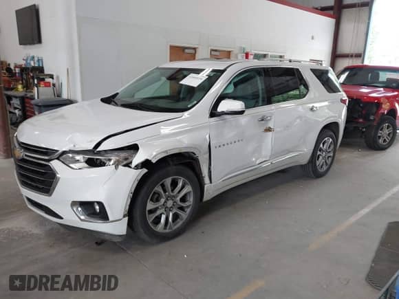 2018 Chevrolet Traverse Premier с VIN 1GNERKKW0JJ101552, выставлен на аукционе IAAI как лот 42609036 с пробегом 130 667 миль миль и . История ставок и продаж доступна на DreamBid. Изображение 17.