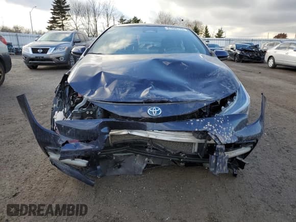 ✅ 2023 Toyota Corolla Hybrid LE • VIN: JTDBDMHE4PJ000799 • Lot: 91820725. Wystawiony na Copart z przebiegiem 72 976 mil. Bezpłatny archiwum sprzedaży aukcyjnych z USA i szczegółowy raport historii pojazdu na DreamBid. Zdjęcie 5.