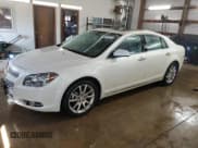 ✅ 2012 Chevrolet Malibu LTZ 1LZ • VIN: 1G1ZE5E00CF121944 • Lot: 77582084. Listed on Copart with 158,657 mi. Free auction sales archive from the USA and detailed vehicle history report at DreamBid. Image 1.