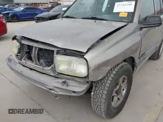 ✅ 2003 Chevrolet Tracker • VIN: 2CNBE13C936919654 • Lot: 43745588. Listed on IAAI with 158,377 mi. Free auction sales archive from the USA and detailed vehicle history report at DreamBid. Image 6.