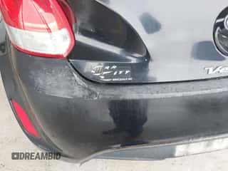 2013 Hyundai Veloster w/Black Int with VIN KMHTC6AD3DU160506, listed as a IAAI auction lot 43547188 with 174,692 mi miles and . Bid and sale history available at DreamBid. Image 6.