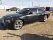 2009 Dodge Charger SXT с VIN 2B3KA33V39H507225, выставлен на аукционе Copart как лот 76617284 с пробегом 146 428 миль миль и Чистый • Clean title. История ставок и продаж доступна на DreamBid. Изображение 1.