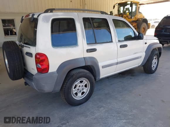 ✅ 2003 Jeep Liberty Sport • VIN: 1J4GK48K13W553970 • Lot: 43794068. Listed on IAAI with 209,519 mi. Free auction sales archive from the USA and detailed vehicle history report at DreamBid. Image 4.