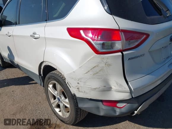 ✅ 2016 Ford Escape SE • VIN: 1FMCU0G79GUB71042 • Lot: 43315061. Listed on IAAI with 104,822 mi. Free auction sales archive from the USA and detailed vehicle history report at DreamBid. Image 6.