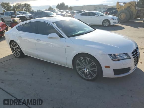 ✅ 2014 Audi A7 Premium Plus • VIN: WAUWGAFC7EN125906 • Lot: 86615005. Listed on Copart with 137,466 mi. Free auction sales archive from the USA and detailed vehicle history report at DreamBid. Image 4.