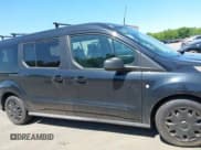 ✅ 2014 Ford Transit Connect XLT • VIN: NM0GS9F70E1136158 • Lot: 42363625. Listed on IAAI with 168,402 mi. Free auction sales archive from the USA and detailed vehicle history report at DreamBid. Image 13.